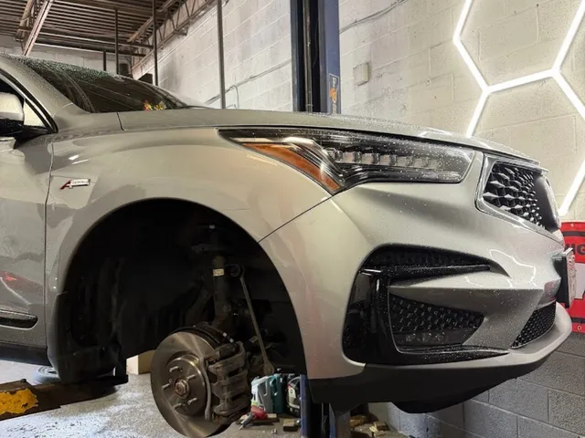 Acura RDX on the lift for suspension and brake work